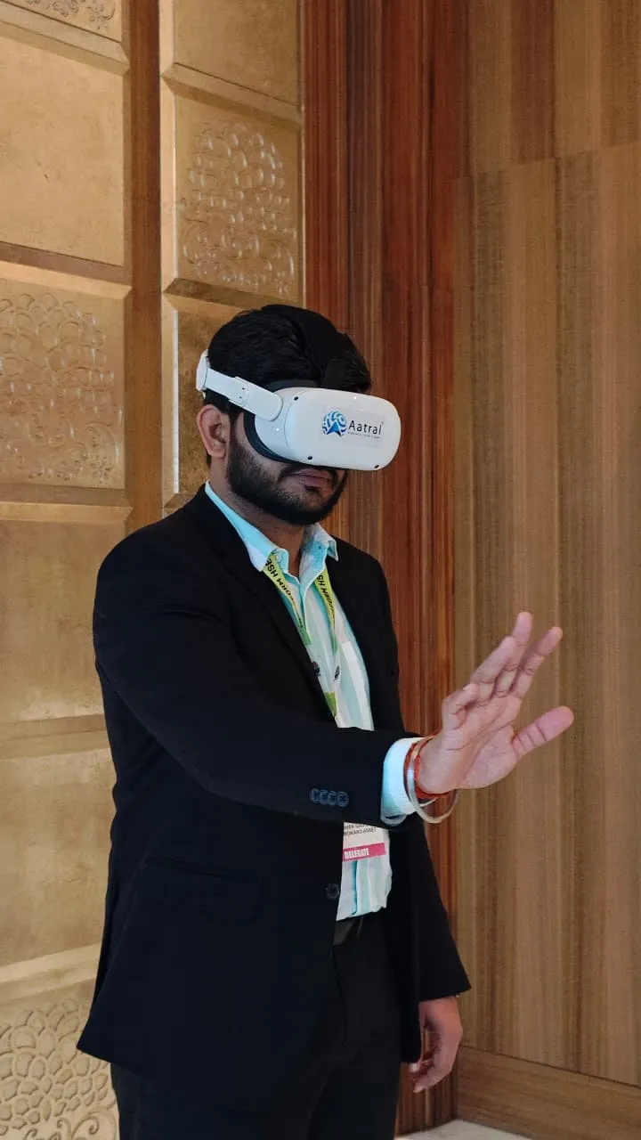 Attendee trying a Safetizen VR safety module on an Aatral headset at an industry safety event